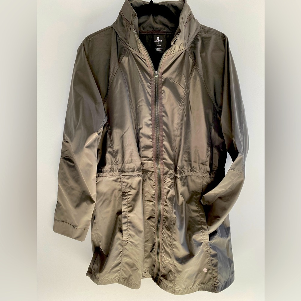 Apana Rain Jacket. Zip front with tuck-away hood. New with tags